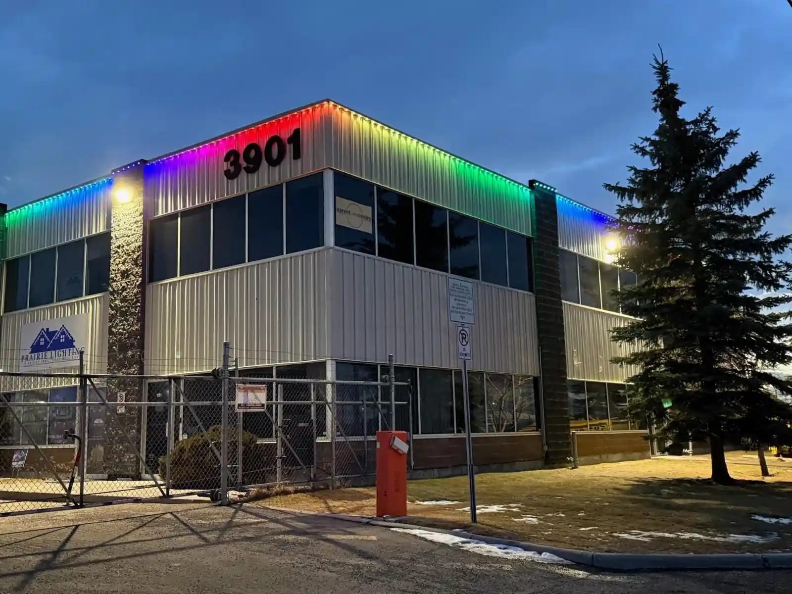 Commercial permanent LED lighting on Edmonton office building at night