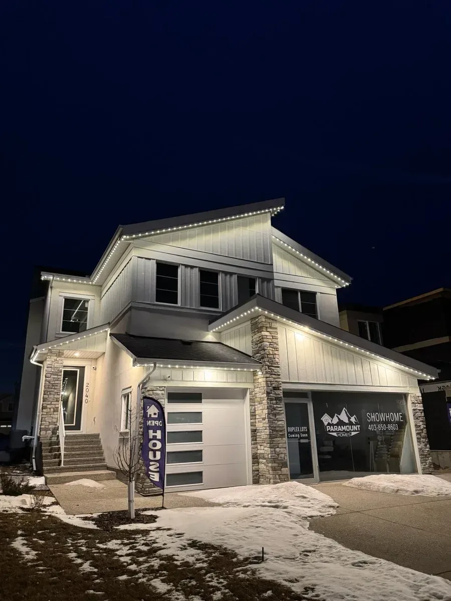 Edmonton home illuminated in warm white with the Prairie Lighting system
