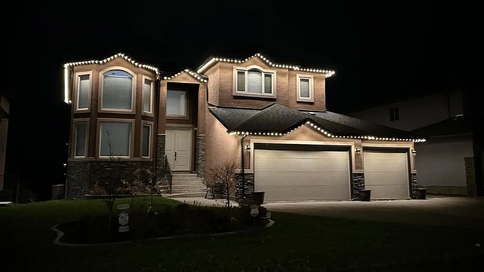 Warm white permanent outdoor lighting installation 1