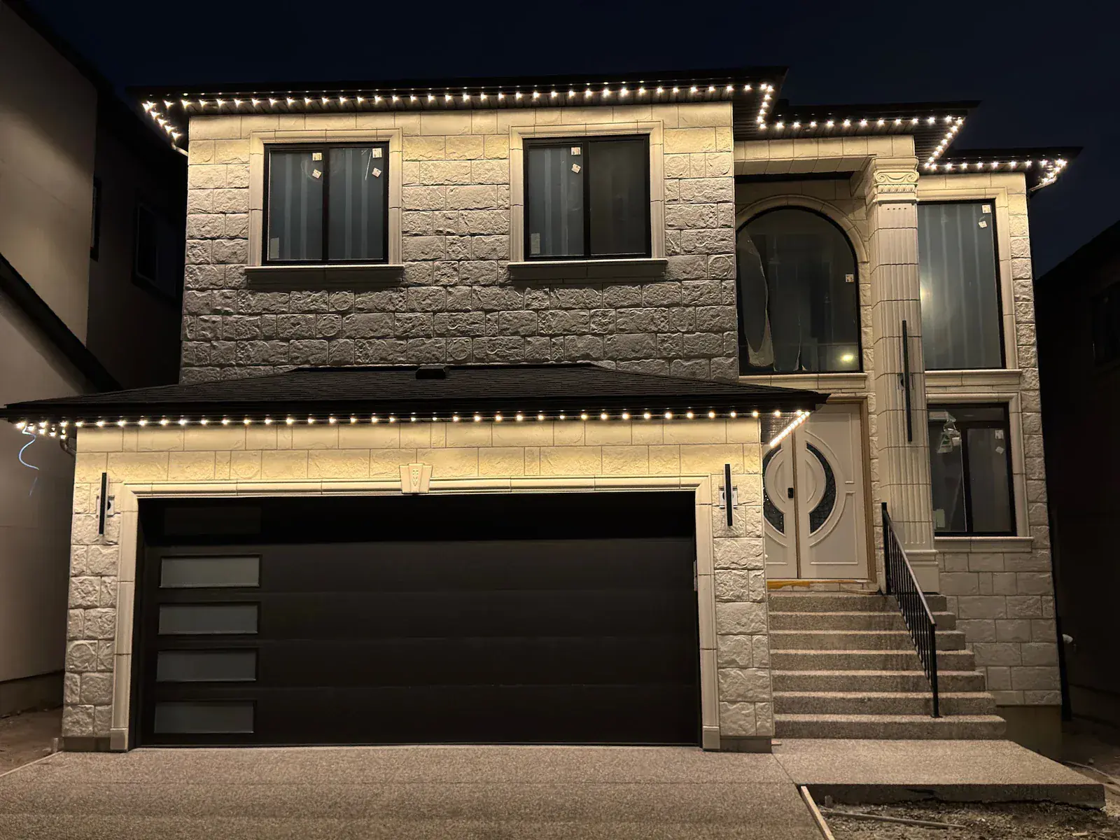 One Edmonton home lit in a different colour 4