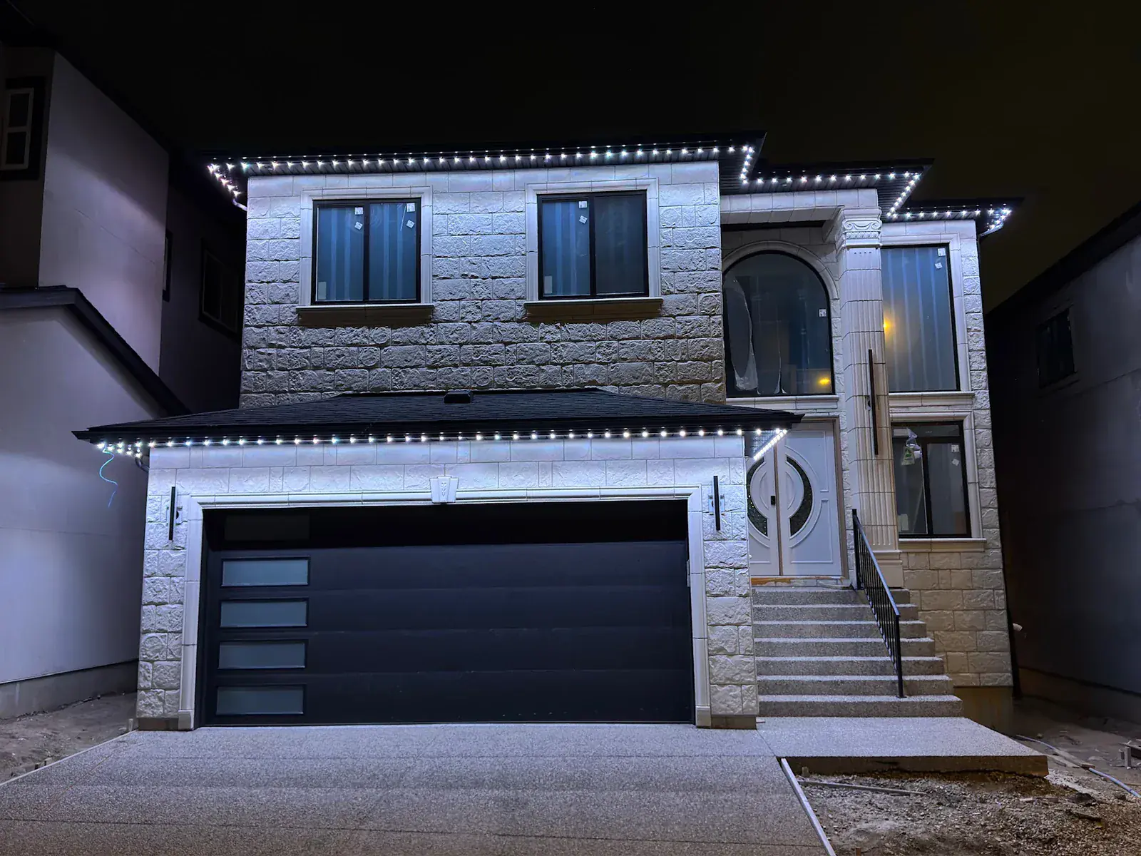 One Edmonton home lit in a different colour 5
