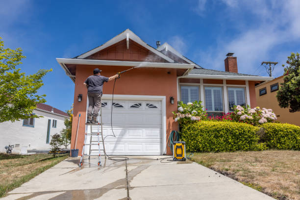Pressure washing home exterior